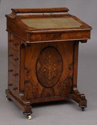 Appraisal: ENGLISH VICTORIAN FIGURED WALNUT AND MARQUETRY DAVENPORT The stationery compartment