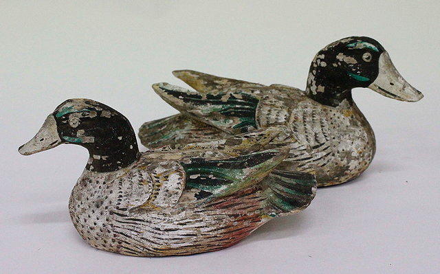 Appraisal: TWO OLD WOODEN PAINTED DECOY DUCKS each cm in length