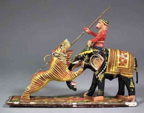 Appraisal: A Kashmiri carved wood gesso and painted figure of a