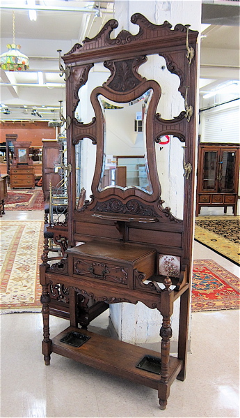 Appraisal: A LATE VICTORIAN CARVED OAK HALLSTAND English c the upper