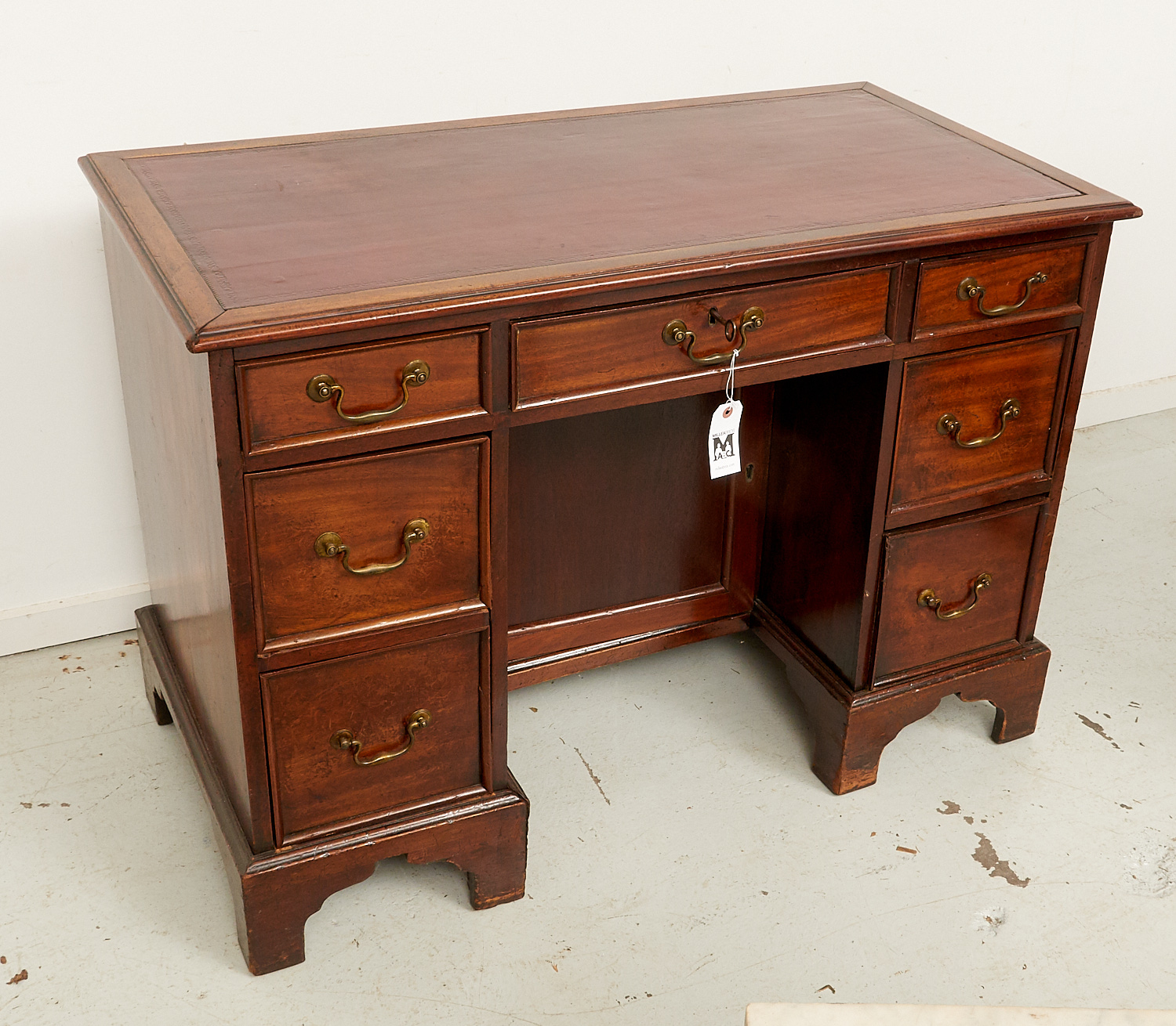 Appraisal: GEORGE III MAHOGANY LEATHER TOP KNEEHOLE DESK th c English