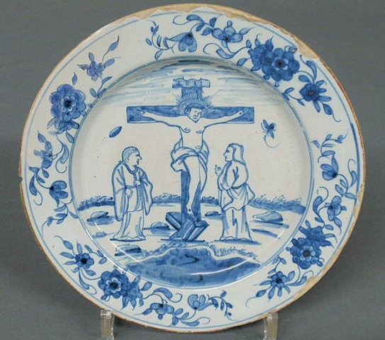 Appraisal: Rare blue and white English Delft plate depicting the Crucifixion