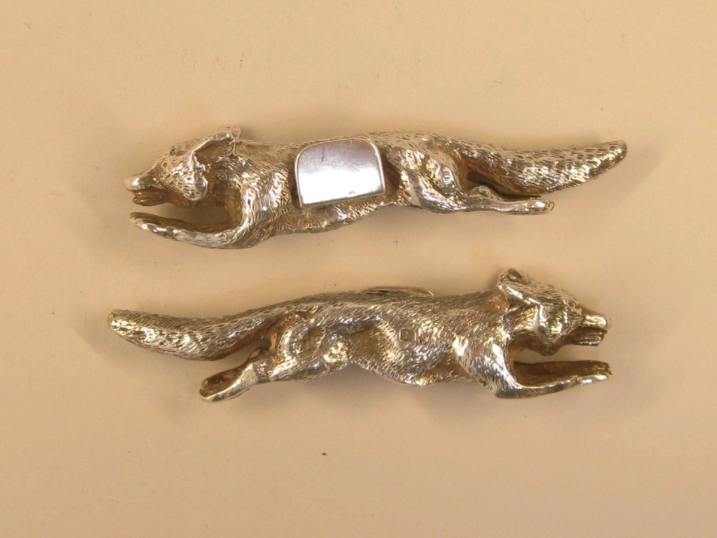 Appraisal: Pair of silver Menu Holders in the form of foxes