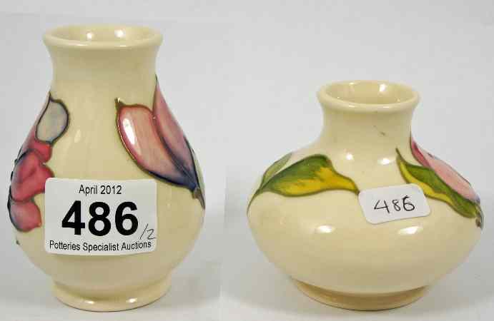 Appraisal: Moocroft Vases decorated with Magnolias on Cream Background one is