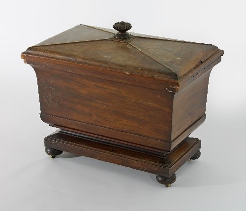 Appraisal: A Regency mahogany sarcophagus shaped wine cooler the hinged cover