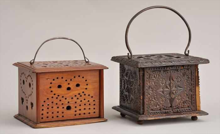 Appraisal: TWO CARVED WOOD FOOT WARMERS WITH SWING HANDLES The larger