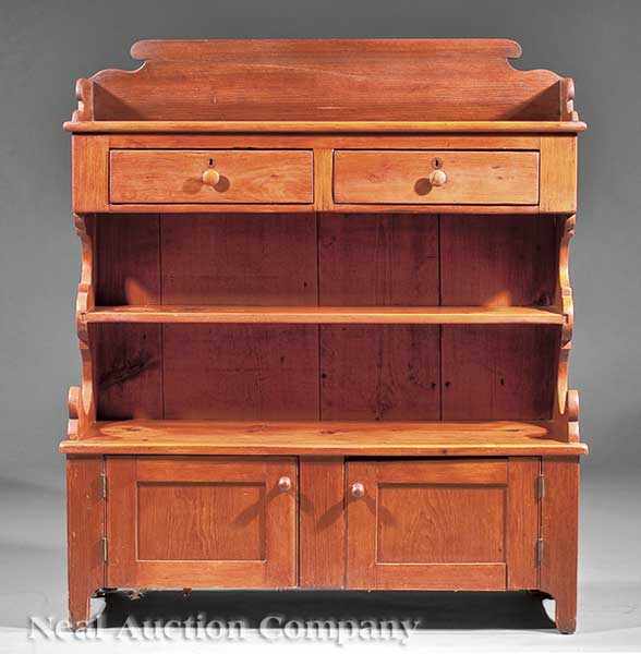 Appraisal: An Antique American Pine Bookcase and Cabinet shaped gallery above