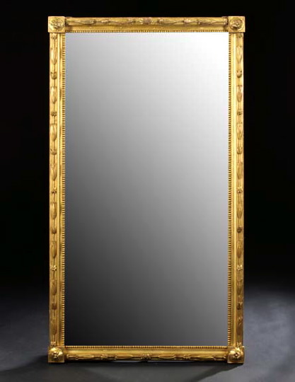 Appraisal: Empire-Style Giltwood Looking Glass mid- th century the bisected rectangular