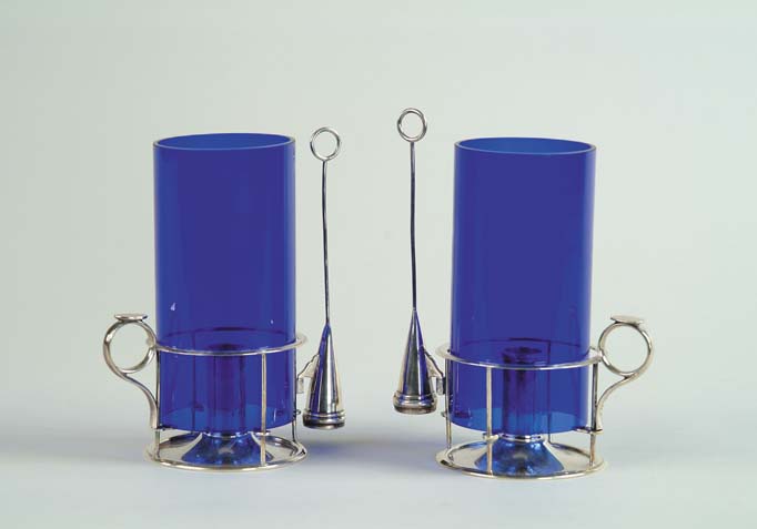 Appraisal: PAIR OF INTERESTING STERLING AND COBALT GLASS CHAMBERSTICKS BY TIFFANY