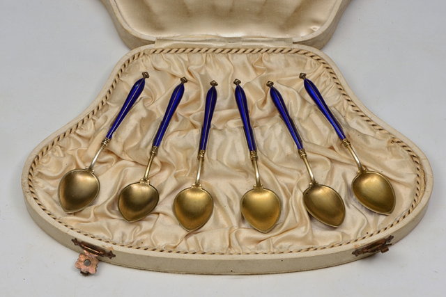 Appraisal: A CASED SET OF NORWEGIAN SILVER GILT AND ENAMEL TEASPOONS