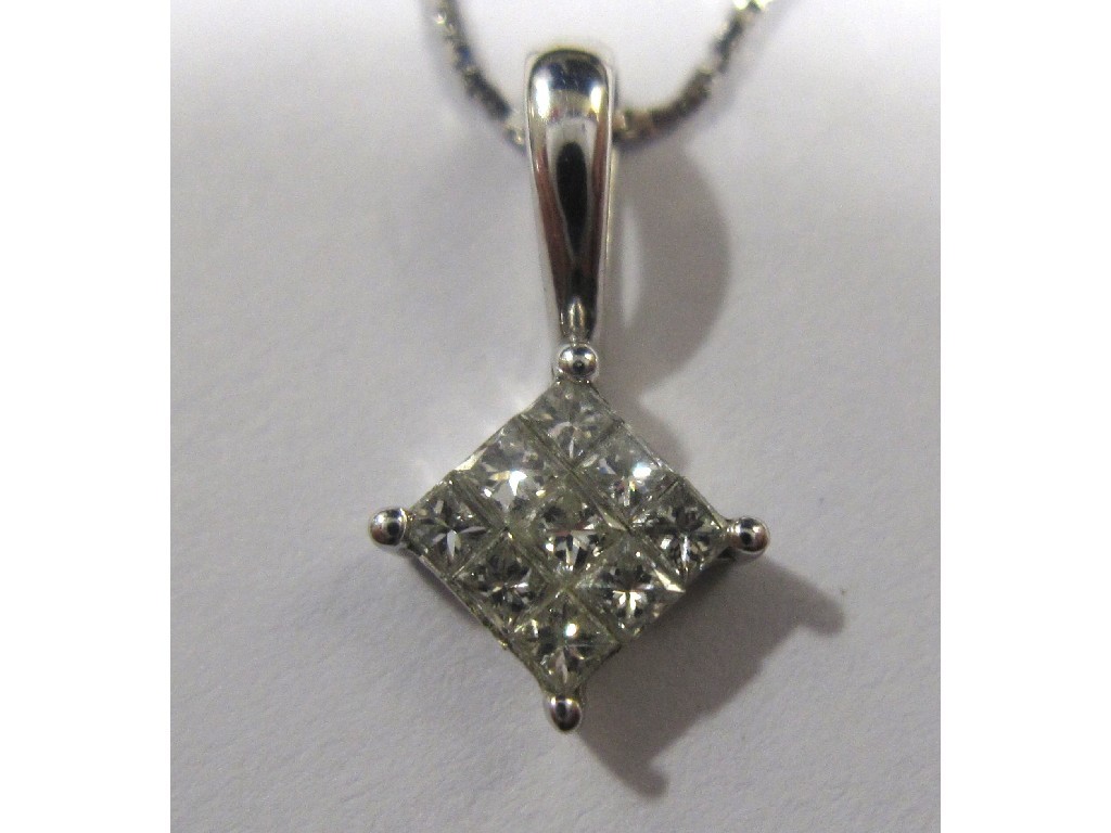 Appraisal: Nine carat white gold princess cut diamond cluster pendant with