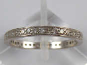 Appraisal: A white metal tests carat gold diamond eternity ring approx