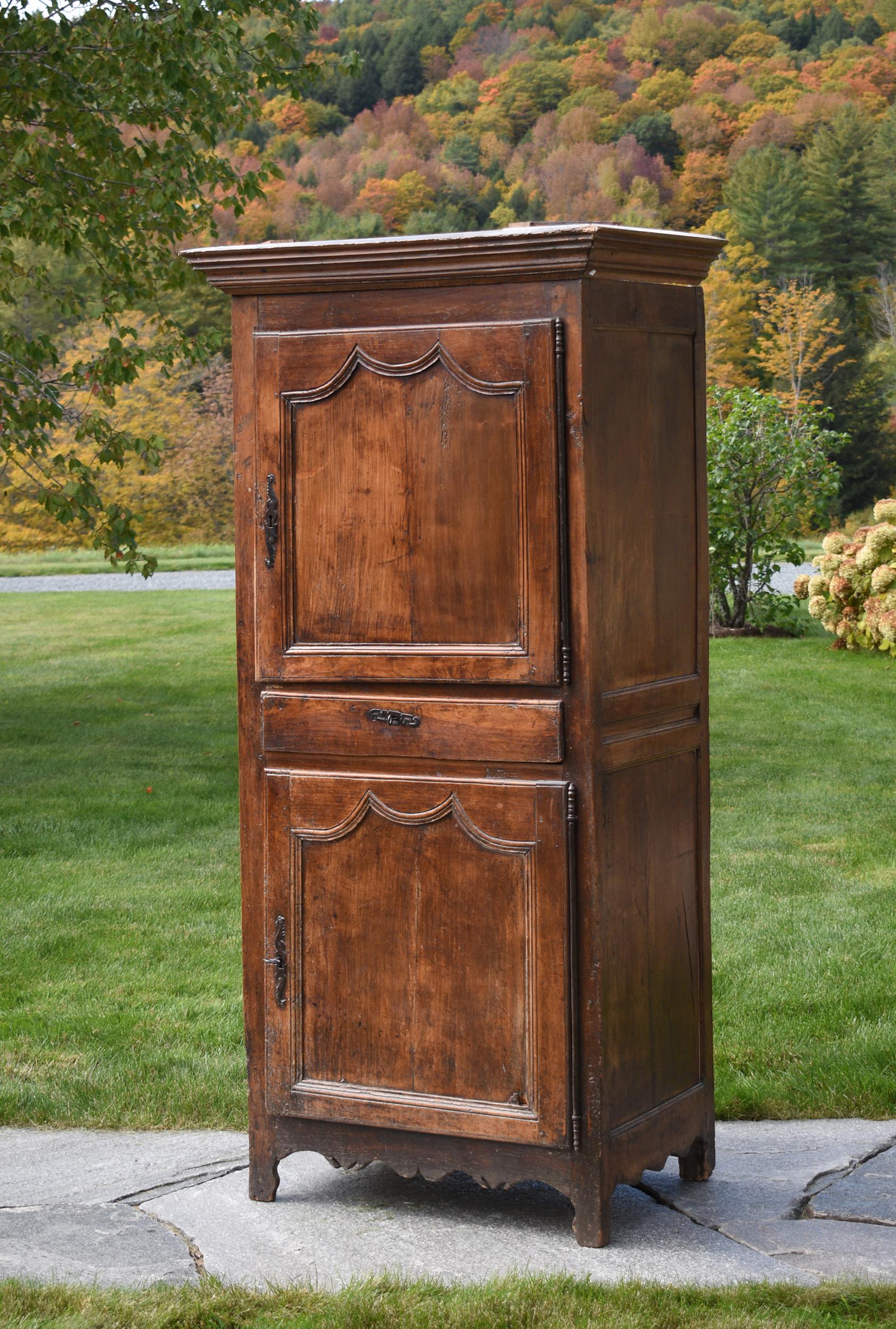 Appraisal: TH C NARROW FRENCH FRUITWOOD CUPBOARD A carved th C