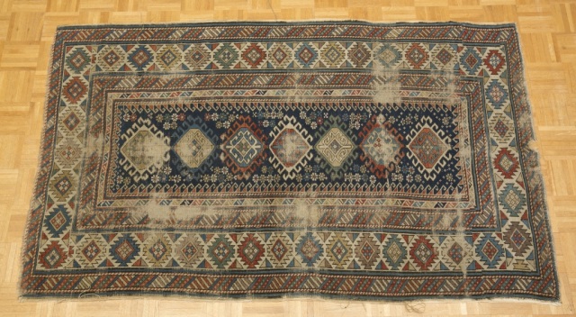 Appraisal: Caucasian Area Rug Considerable wear ' L x ' W