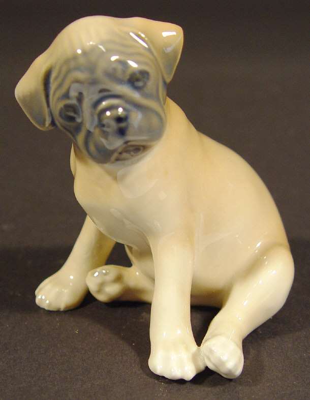 Appraisal: Royal Copenhagen china pug dog with hand painted decoration printed