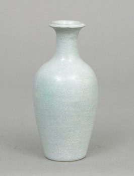 Appraisal: A Small Chinese Monochrome Vase Gracefully shaped baluster form porcelain