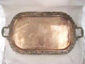 Appraisal: A silver plated two handled tray with applied vine and