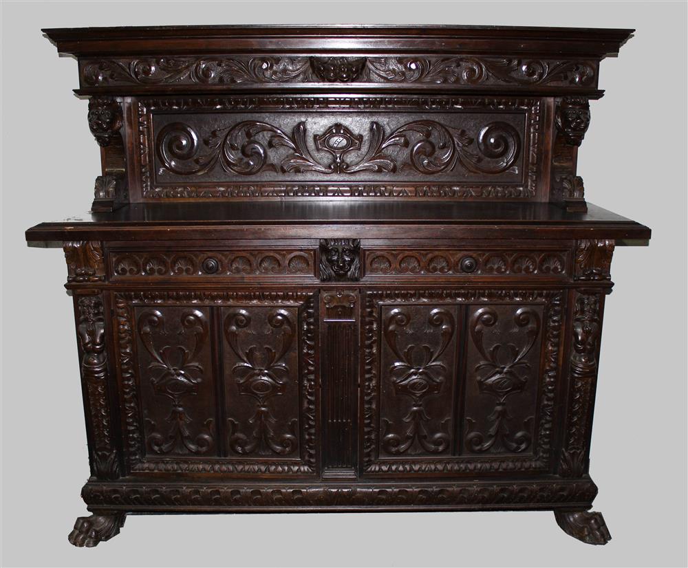 Appraisal: RENAISSANCE REVIVAL RELIEF CARVED SIDEBOARD the molded cornice over a