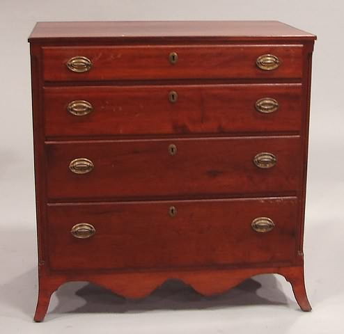 Appraisal: Cherry Four graduated lipped drawers flanked by reeded quarter columns