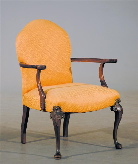 Appraisal: Georgian style carved mahogany armchair late th century arched back