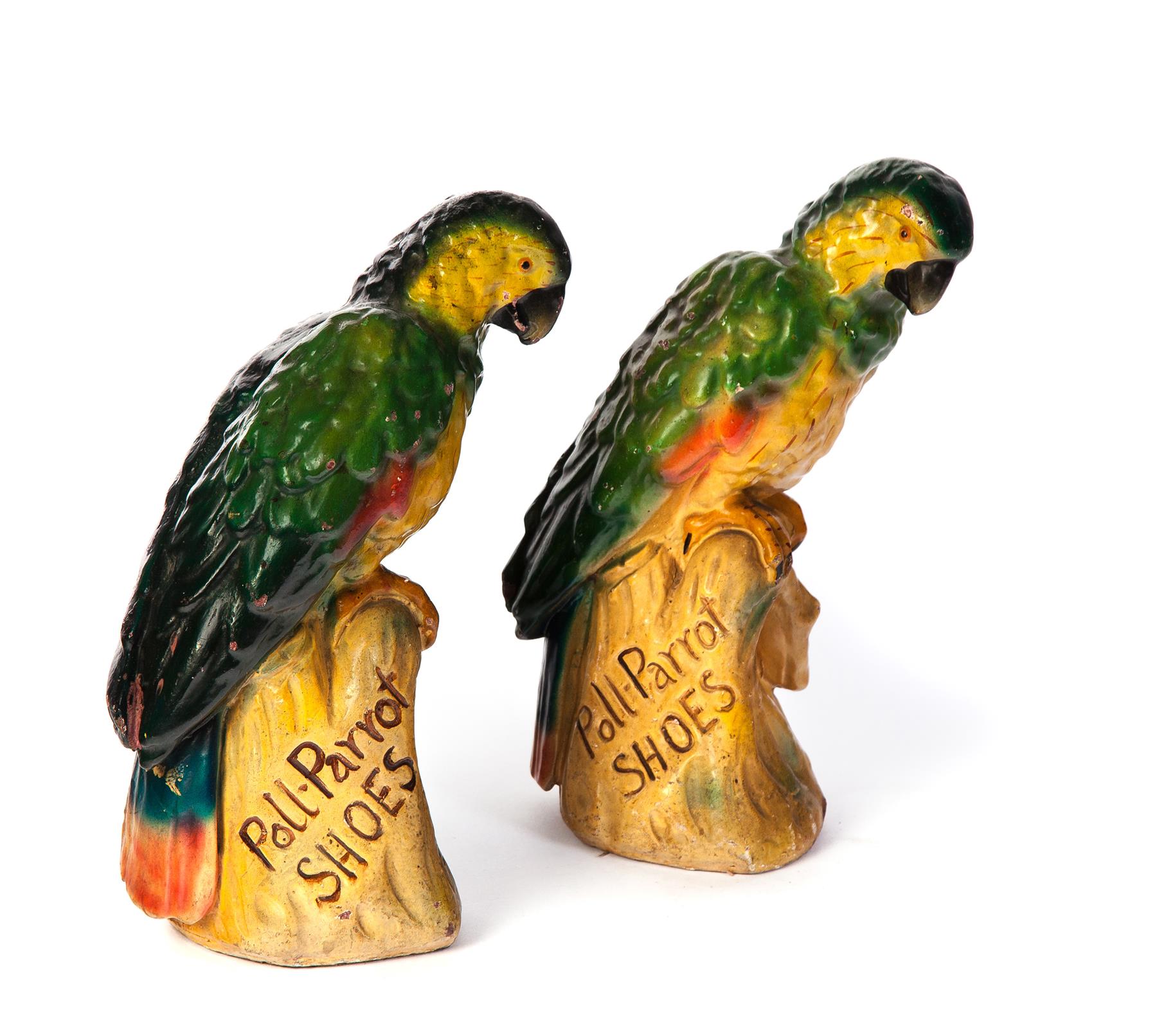 Appraisal: PAIR OF PAINTED POTTERY POLL-PARROT ADVERTISEMENTS American th century Poll-Parrot