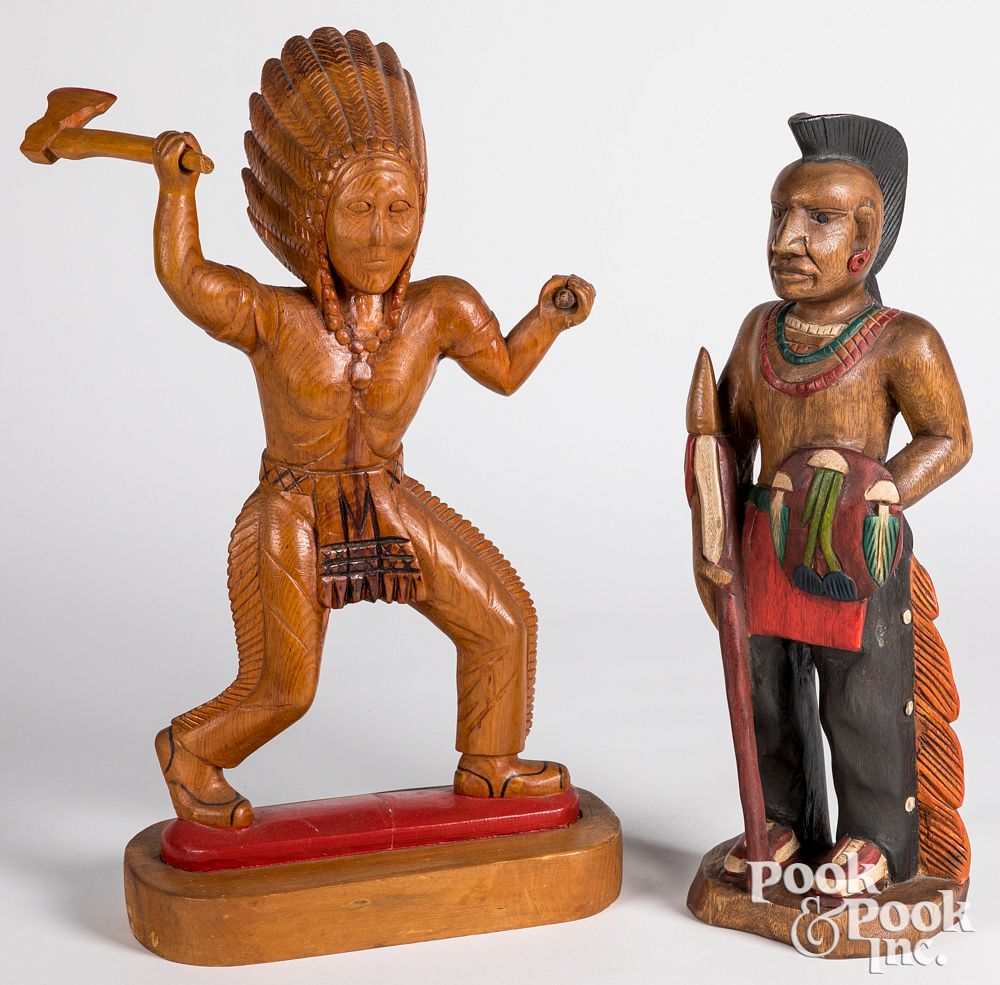 Appraisal: Two carved pine figures of Native American Indians Two carved