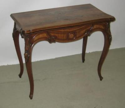 Appraisal: A VICTORIAN MAHOGANY FOLDING CARD TABLE in the Louis XV