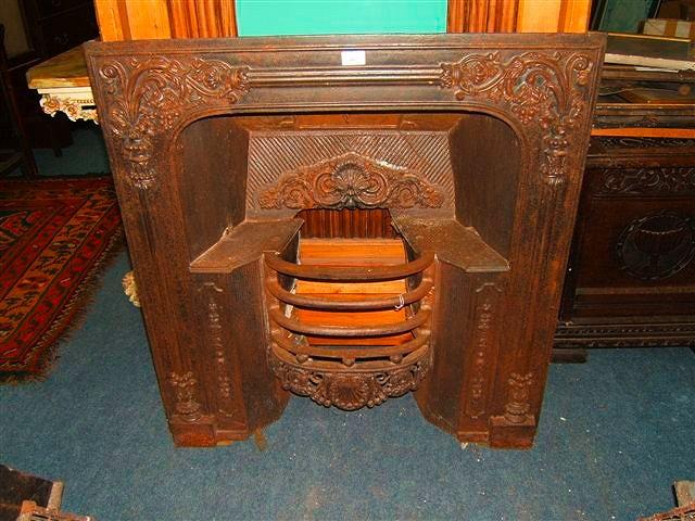 Appraisal: An early th Century cast iron Victorian fire place wide