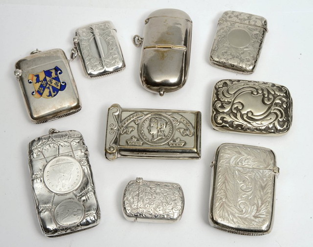 Appraisal: A SILVER VESTA CASE with enamel crest a small silver