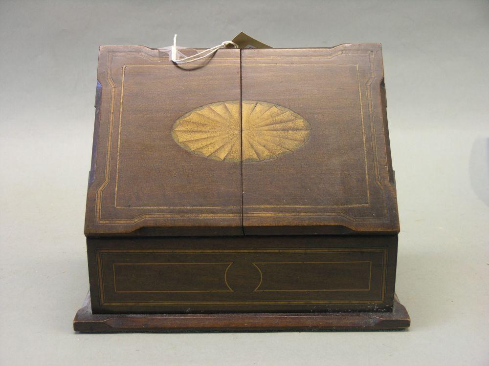 Appraisal: A Victorian leather box dated walnut and brass mounted writing