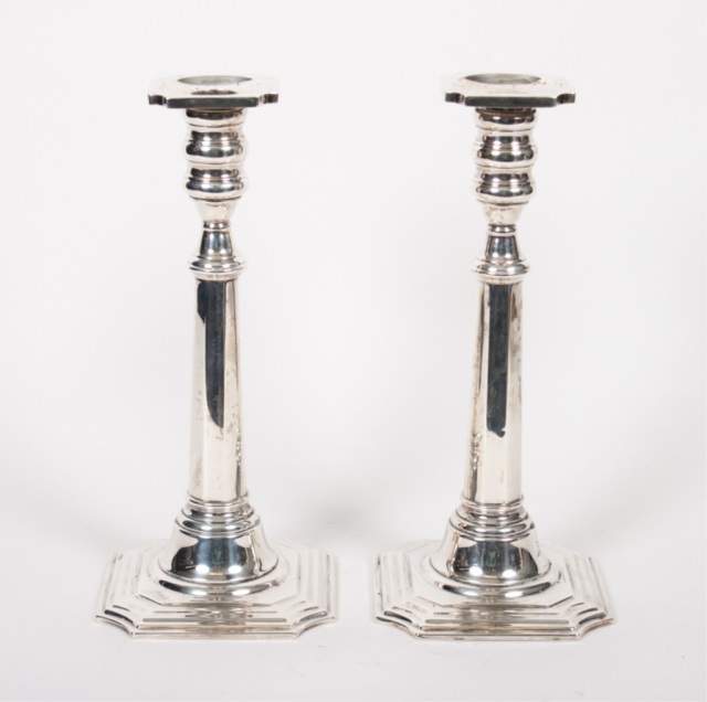 Appraisal: Pr Cartier weighted sterling silver candlesticks in H