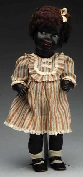 Appraisal: Flirty Black Character Baby Doll German composition socket head incised