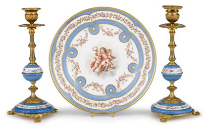 Appraisal: Pair of Sevres style porcelain and gilt bronze candlesticks early