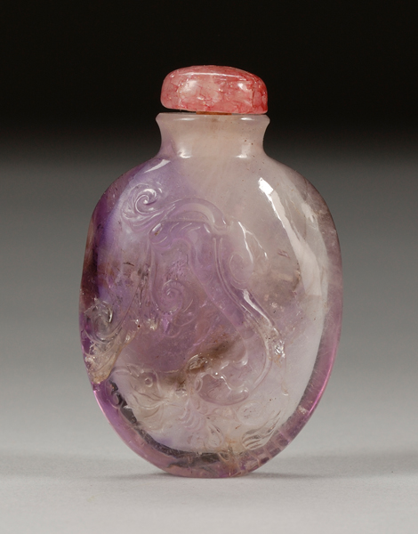 Appraisal: Amethyst Snuff Bottle th century very well hollowed surface carved