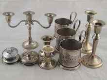 Appraisal: A mixed lot Three white metal Russian tea glass holders