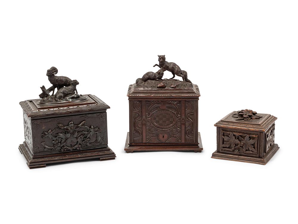 Appraisal: Three Black Forest Carved Wood Humidors Three Black Forest Carved