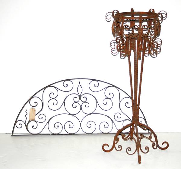 Appraisal: A wrought iron over door and jardiniere