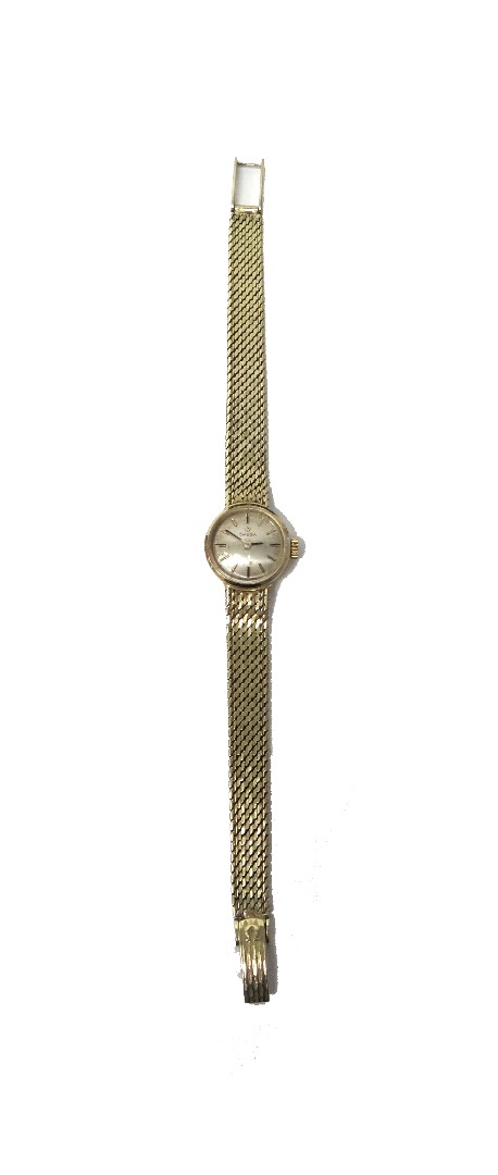 Appraisal: A lady's gold Omega bracelet wristwatch the signed circular silvered