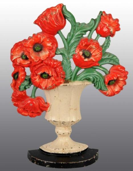 Appraisal: Cast Iron Poppies Doorstop Description Made by Hubley and numbered