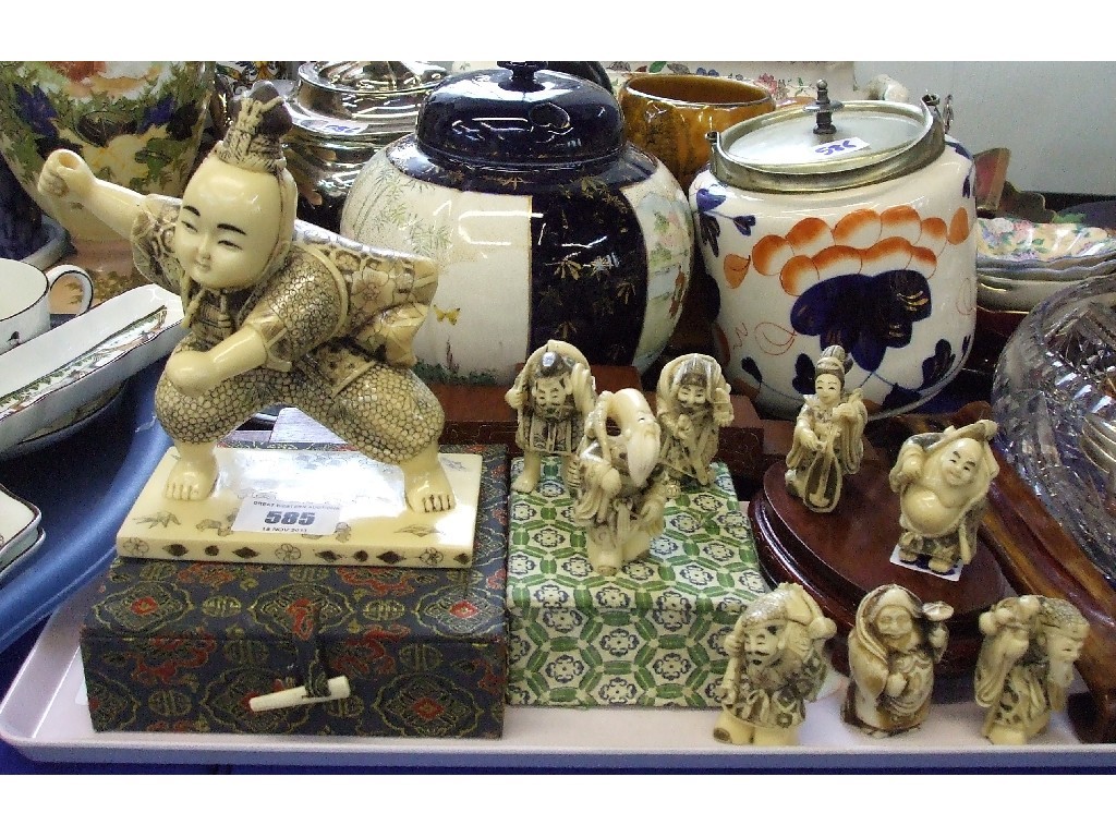 Appraisal: Tray lot comprising Chinese netsukes figures and stands