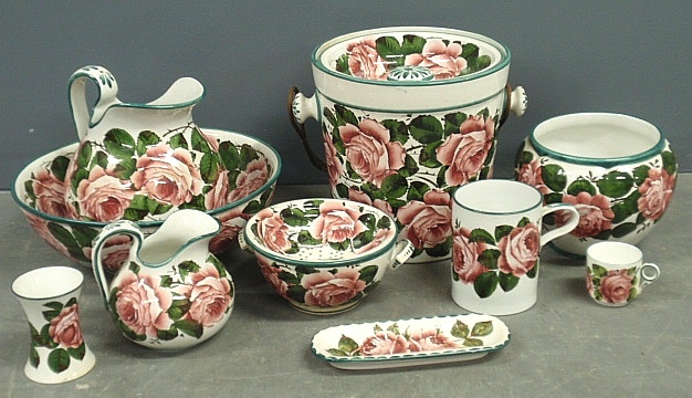 Appraisal: - Nine pieces of Wemyss pottery to include a cuspidor