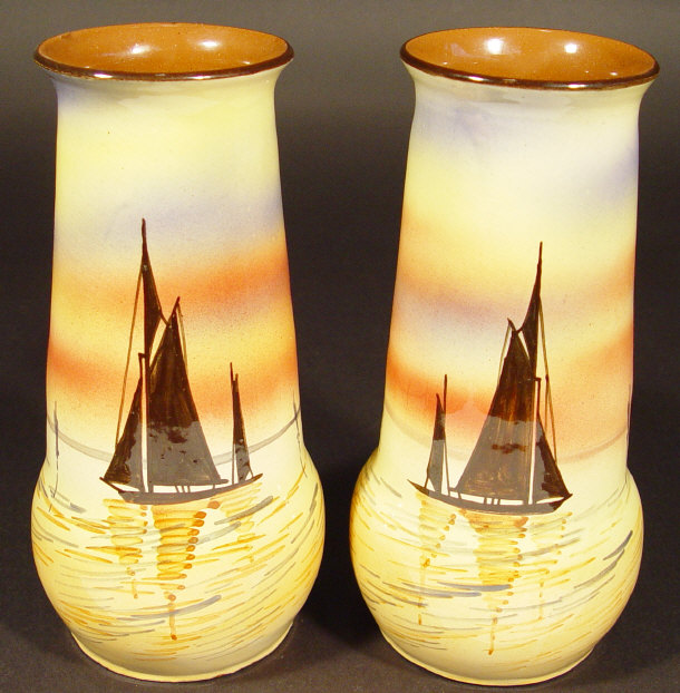 Appraisal: Pair of Watcombe pottery vases hand painted with silhouettes of