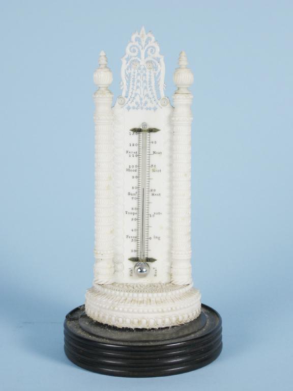 Appraisal: A th Century Indian ivory framed Thermometer with turned half