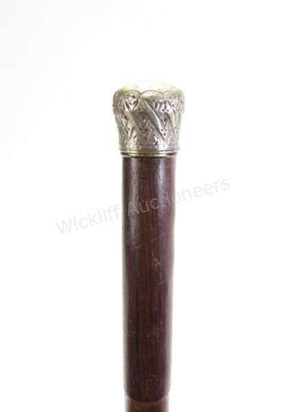 Appraisal: Antique Framer's Cane This ingenious custom made cane is equipped