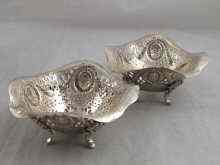 Appraisal: A pair of white metal marked silver German cast and