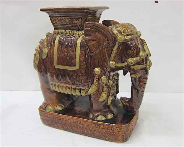 Appraisal: ELEPHANT-FORM POTTERY GARDEN STOOL Chinese th century overall brown glaze