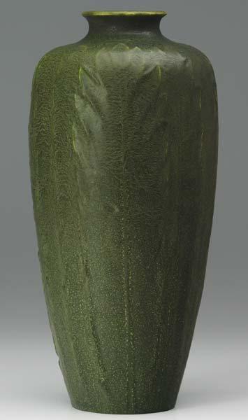 Appraisal: GRUEBY Unusual vase embossed with full-height leaves under a rich