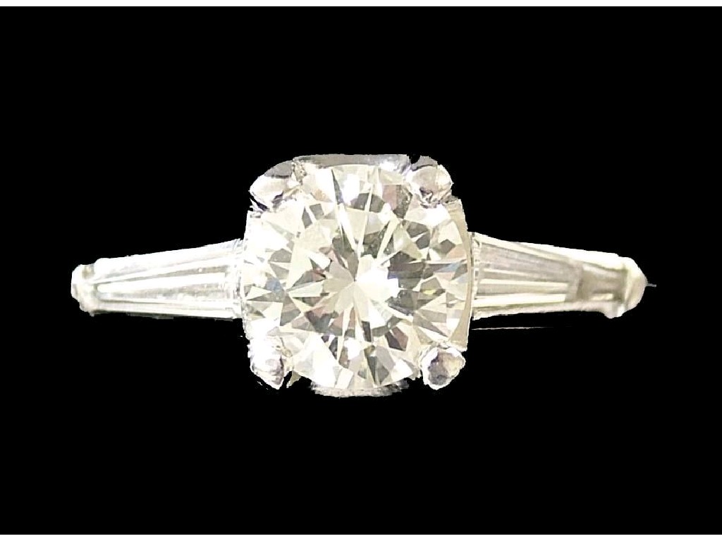 Appraisal: Platinum solitaire diamond ring with baguette set shoulders ct approx