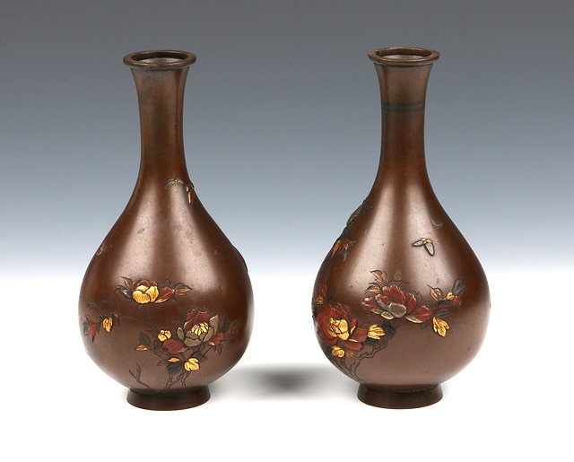 Appraisal: A PAIR OF JAPANESE LACQUER BRONZE VASES of baluster shape