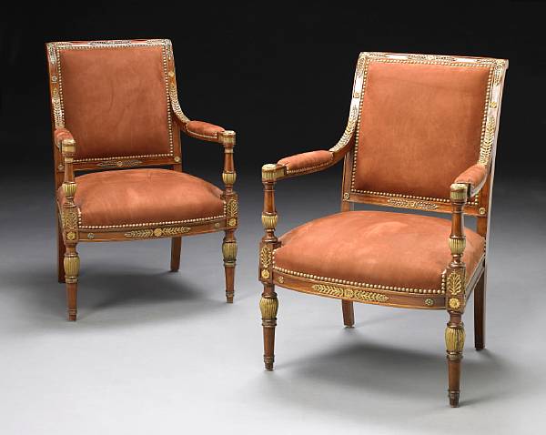 Appraisal: A pair of Empire syle gilt bronze mounted mahogany fauteuils